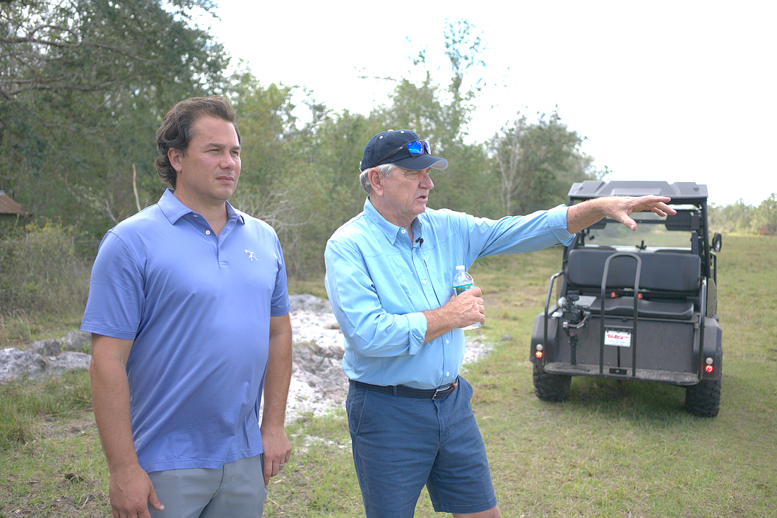 Soleta's Charles Duff and World Golf Hall of Fame player Nick Price talk about the design of the course at the site in Myakka City.