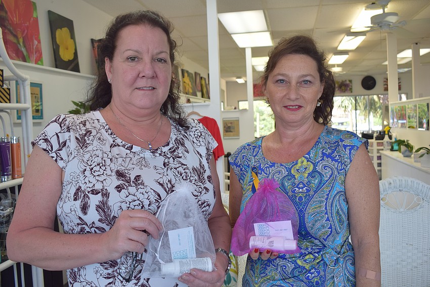Celia Moore and Irina Bronstein in Design 2000 Salon during Summer Night Out at Whitney Beach Plaza