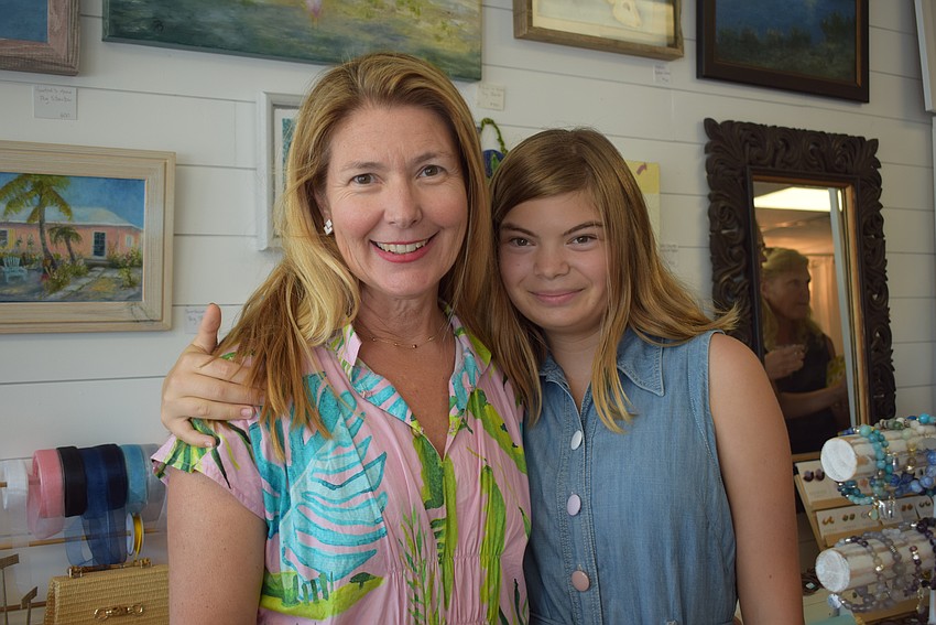 Heather and Lark Rippy at Driftwood Beach Home and Plaza during Summer Night Out