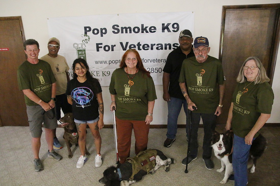 Pop Smoke K9 For Veterans Founder Elisha Perkins and Tobey, Paul Lewis, Nadine Ruland, Jill Dempsey and Enoch, Paul Proctor, Ed and Trudy Manen with Molly. Photo by Jarleene Almenas