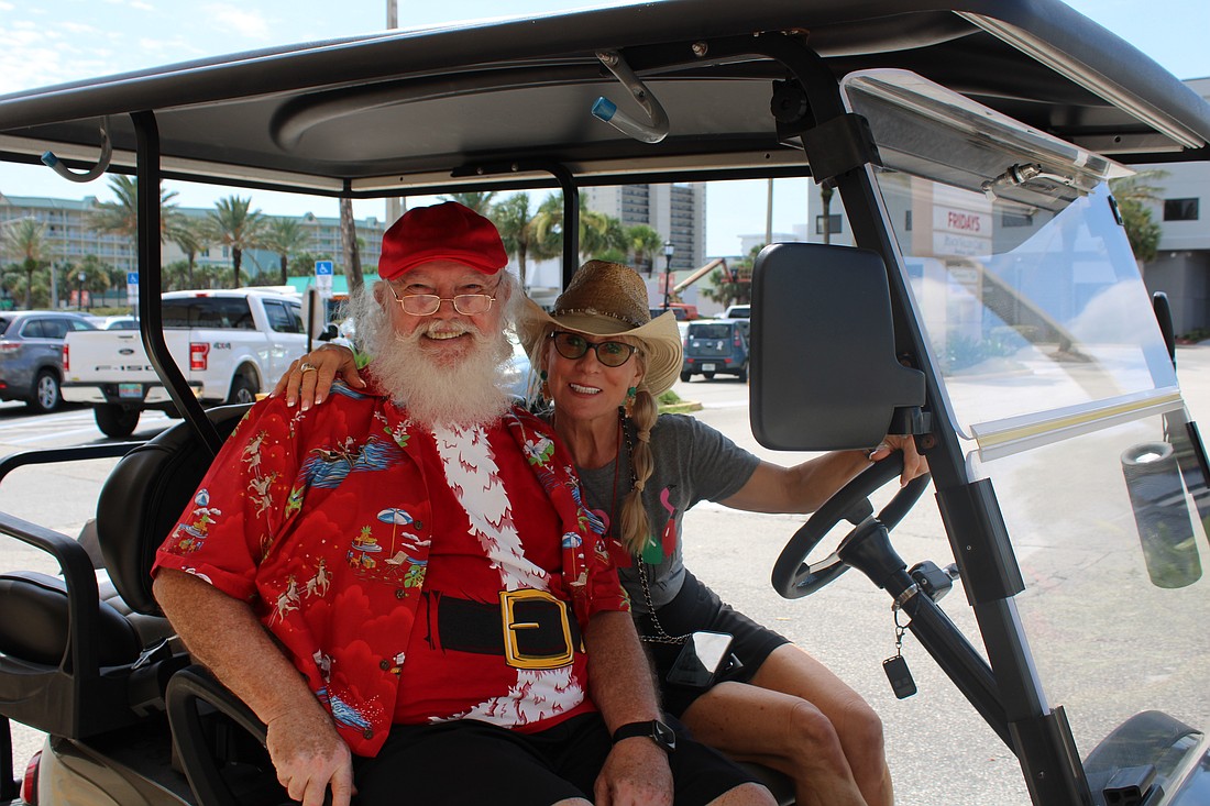 Santa Claus and Nancy Cortez. Photo by Alexis Miller