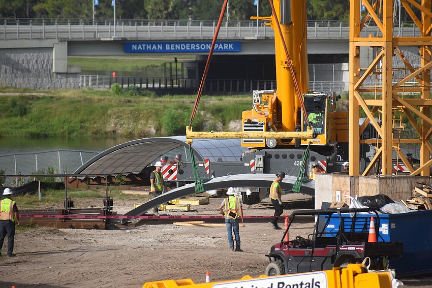 The acrylic window that was lifted Tuesday morning sits in front of the other approximately 15-ton window that was scheduled to be put into place Tuesday afternoon.