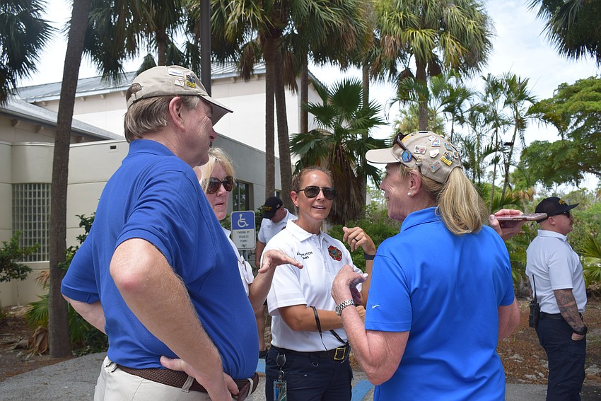 Fire department of Longboat Key and Rotary Club mingle over ice cream on July 25.