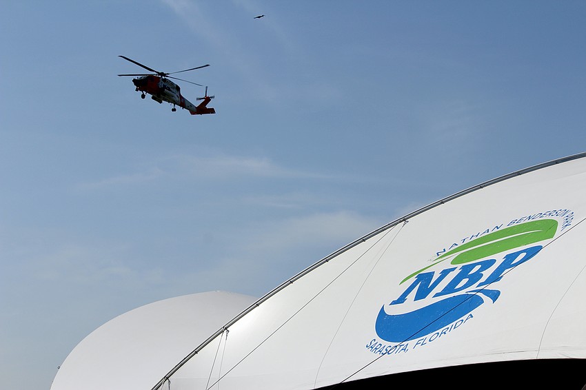 A Coast Guard helicopter flies over Nathan Benderson Park on July 26 for the Spirit of America camp week.