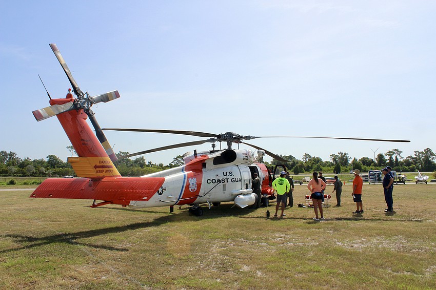 A helicopter lands in the middle of Nathan Benderson Park on July 26 to introduce campers to the U.S. Coast Guard.