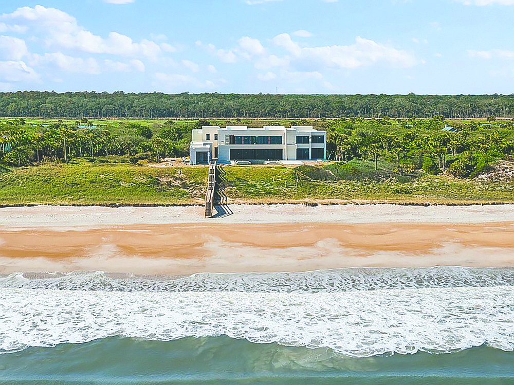 Oceanfront new construction home features six bedrooms, six full and two half-bathrooms, office, media room, wine cellar, bonus room, balcony, cabana, summer kitchen, 1,000-square-foot pool and dune walkover.
