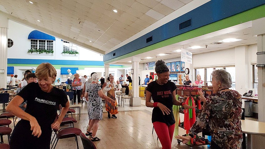 Daisy Saunders leads a dance fitness class.