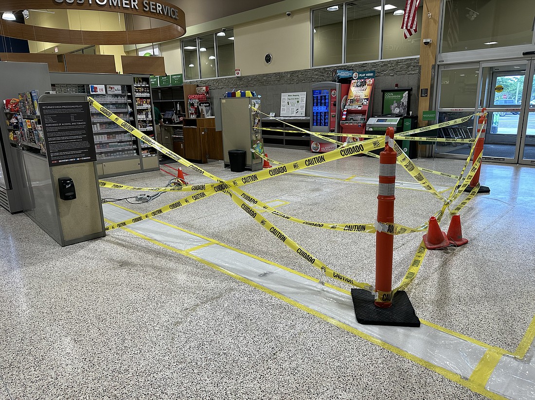 The caution tape around a blank area in Publix on Longboat Key will be replaced with self-checkout machines.