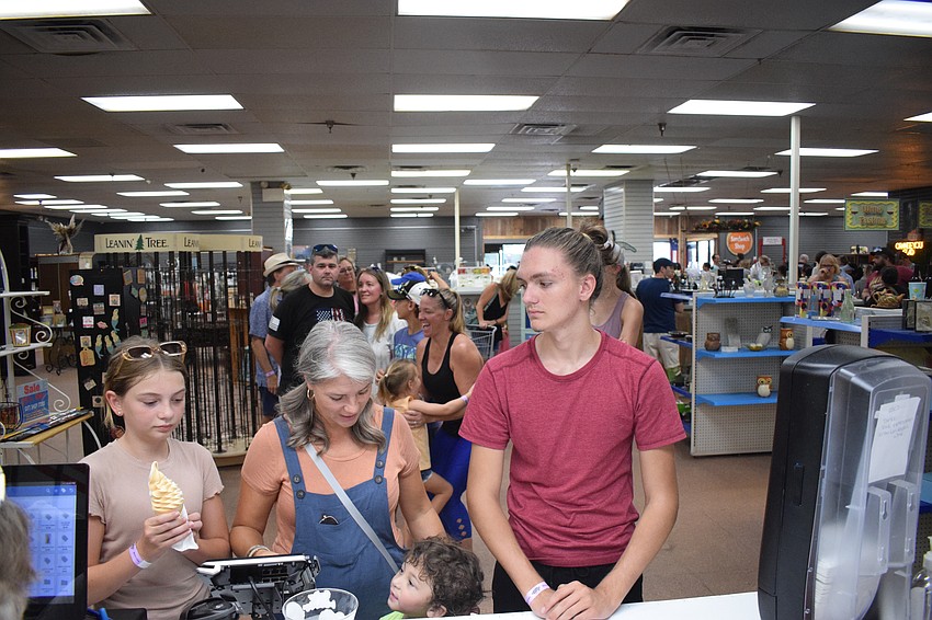 A line for ice cream wraps around the gift shop and cafe at Mixon Fruit Farms.