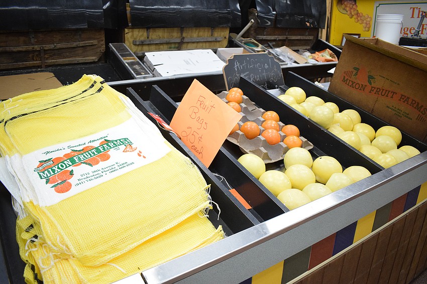 Mixon Fruit Farms sells the last of its bags and fruits before closing its doors.