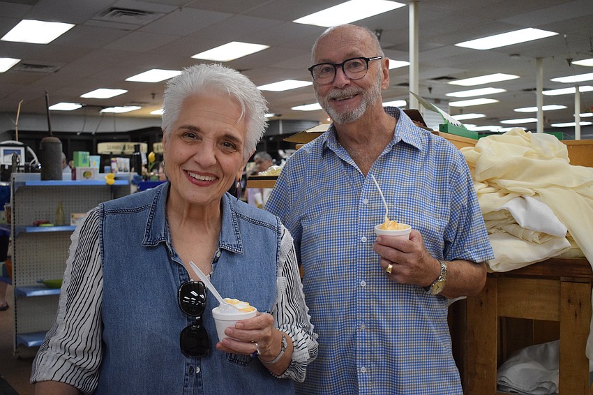 Bradenton's Loretta Lea and Sarasota's David Sellars enjoy ice cream at Mixon Fruit Farms. Lea says she's heartbroken to see Mixon Fruit Farms close. She's been visiting the farm for 50 years.
