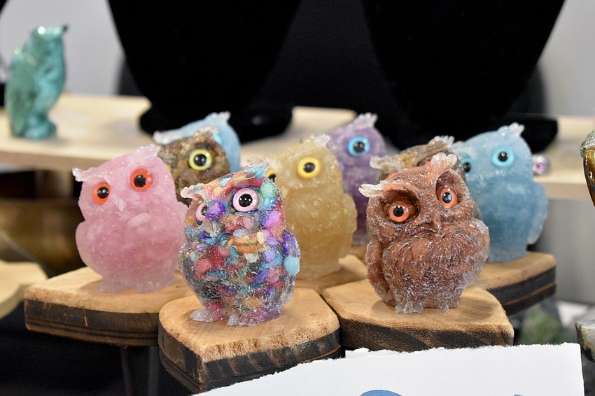 Owls by artist Joseph Caprara sit on display.