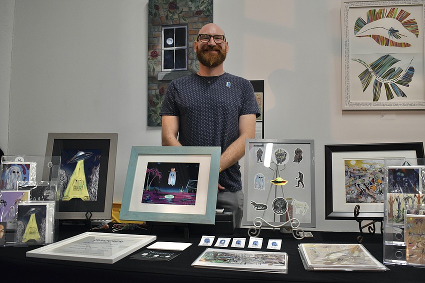 Artist Benjamin Saucier enjoys painting ghosts, UFOs, cryptids, and other mysterious subjects.