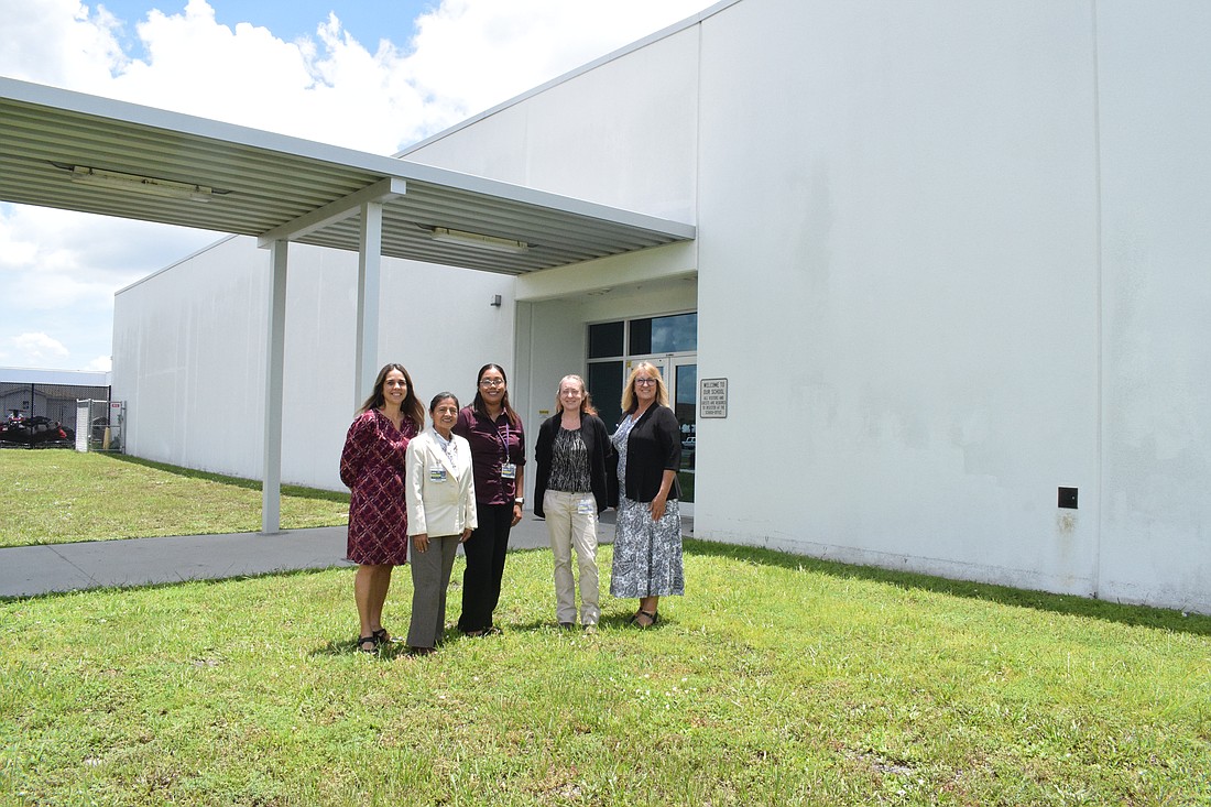 Manatee Technical College career counselors Nancy Beltran, Cecilia Navarrete, Rafaela Carrillo Casique and Gwen Smith-Warzyk and case manager Linda Silva can't wait for the adult education building to be constructed.