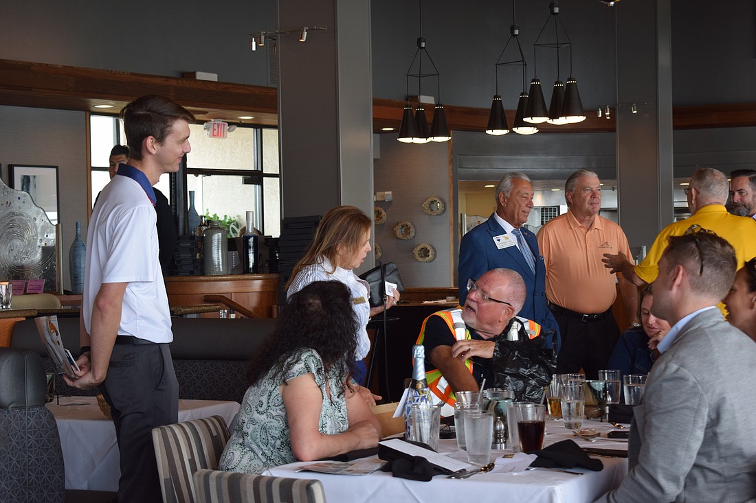 Networking at Noon was hosted at the Chart House from 11:30 p.m. to 1:30 p.m.