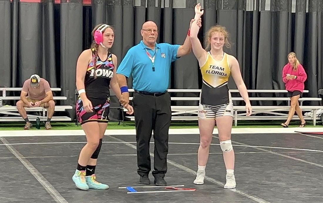 Matanzas wrestlers Kendall Bibla, right, and Christina Borgmann each won two gold medals at the AAU Junior Olympics last July 30. Courtesy photo.
