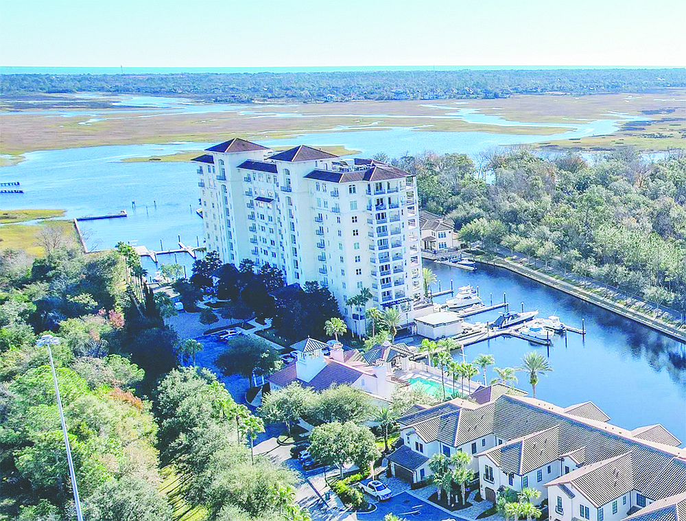 Eighth-floor condominium with Intracoastal Waterway view. Features four bedrooms, four full and one half-bathroom, office, two balconies, two garage spaces and 50-foot boat slip.