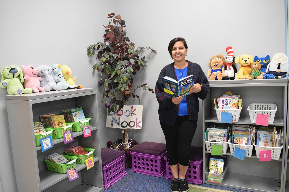 Sarah Orcutt, a second grade teacher at Freedom Elementary School, loves the book nook she's created in her new classroom. She says the new addition is a fresh start.