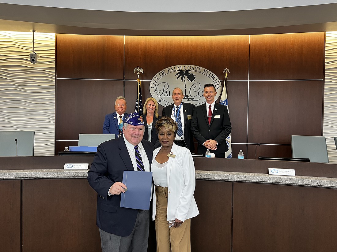 U.S. Army veteran Charles Hanger with City Council members Cathy Heighter (front), Ed Danko, Theresa Carli Pontieri, Mayor David Alfin and Nick Klufas. Photo courtesy of the city of Palm Coast