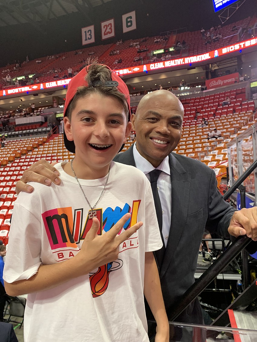 Colton Rossi, a seventh grader at Lakewood Ranch Preparatory Academy, meets Charles Barkley before the start of a Miami Heat finals game in June.