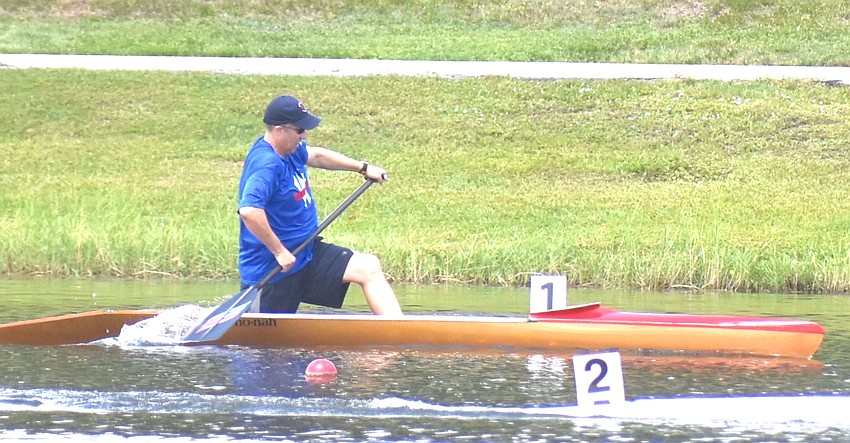 Lakewood Ranch's Adrian Olivo chugs toward the finish of the Men's Masters B 200 meters at Nathan Benderson Park.