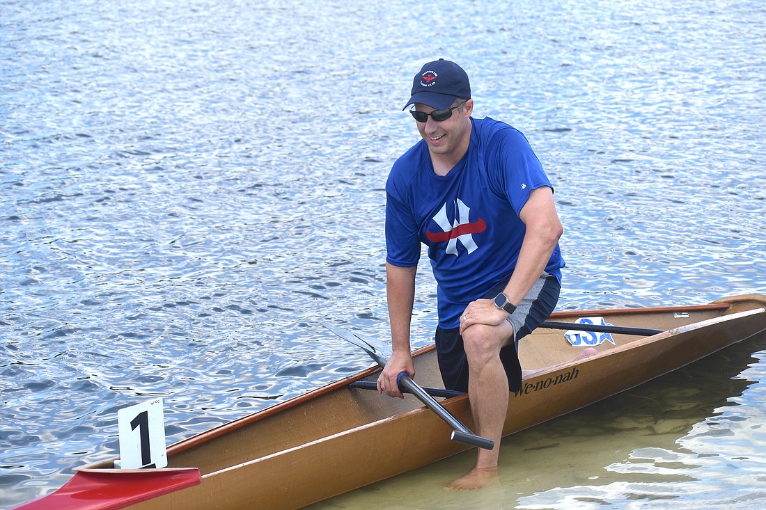 Lakewood Ranch's Adrian Olivo brings his canoe to shore after competing in the Men's Masters B 200 meters of the ACA Sprint Canoe National Championships at Nathan Benderson Park. He finished third in 57.911.