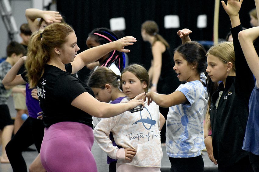Emma Weber, 17, instructs Ela Vardan, 11.
