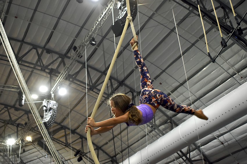 Marney McClain, 9, practices her high-flying skills.