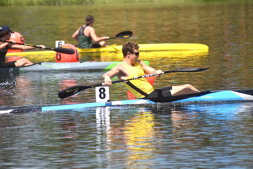 Gannon Erickson gives it his all in the Men's Jr. K-1 200 meters but finishes third at Nathan Benderson Park in the ACA Sprint Canoe National Championships on Friday.