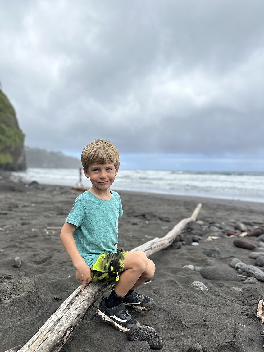 Gabriel Garrison, a kindergartner at Lakewood Ranch Preparatory Academy, takes in the view at a black sand beach on the Big Island of Hawaii.