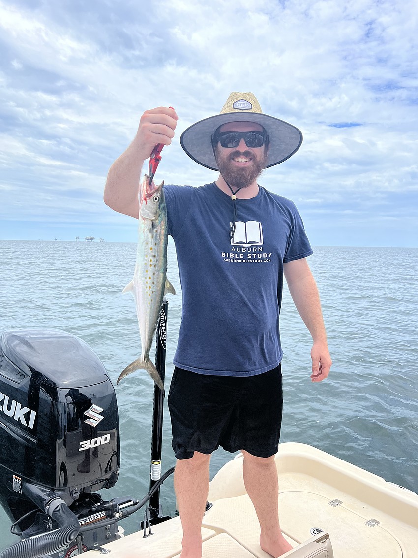 Jay Belmont, a music teacher at Lakewood Ranch Preparatory Academy, with a Spanish mackerel in the waters off Dauphin Island, Alabama.