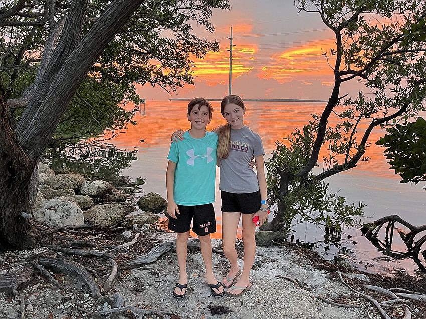 TJ Amato, a sixth grader at Lakewood Ranch Preparatory Academy, and his sister Morgan Amato, a freshman at Parrish Community High School, take in a beautiful Florida Keys sunset.