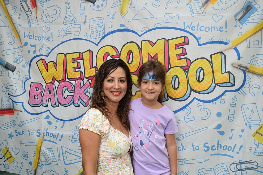 Sarasota's Dagmar Rodriguez and 6-year-old Alessandra Perez are ready for the new school year.