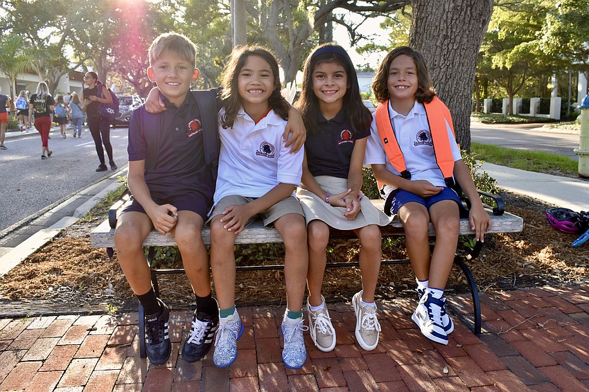 8-year-old Andreas Kobajilo, Charles Pimentel, Vivian Masters, and Oliver Milligan