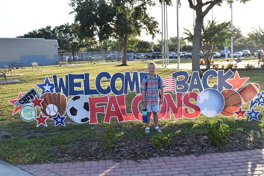Colton Gierhart, 7, begins his first day in second grade at Freedom Elementary. Is he happy to be back in school? 