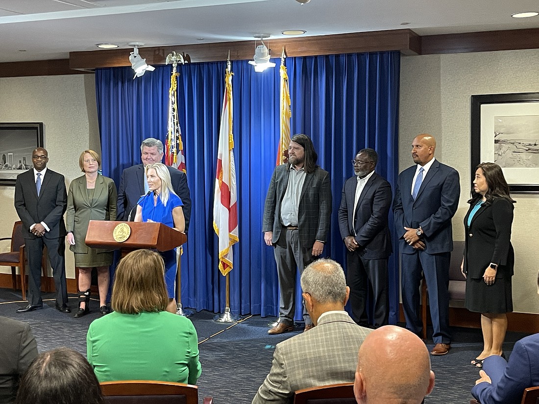 Jacksonville Mayor Donna Deegan takes to the podium Aug. 10 at City Hall to announce seven appointments to her administration. The appointees are, from left, Jacksonville Small and Emerging Businesses (JSEB) Administrator  Gregory Grant; General Counsel Randy DeFoor; Diversity Manager for the Jacksonville Human Rights Commission Jimmy Midyette; Deegan; City Council Liason Bill Delaney; Executive Director of the Jacksonville Human Rights Commission Rudy Jamison Jr.; Chief of Sports & Entertainment Division Alex Alston; Director of Public Works Nina Sickler.