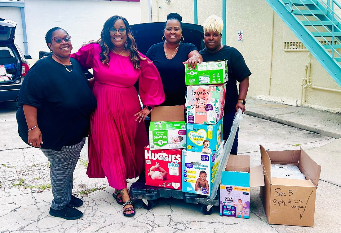 The Junior League of Daytona Beach distribute diapers to Childrens Home Society. Courtesy photo