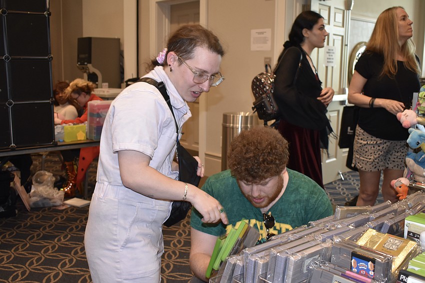 Justin Hudlow and Max Linden browse the video games on offer.