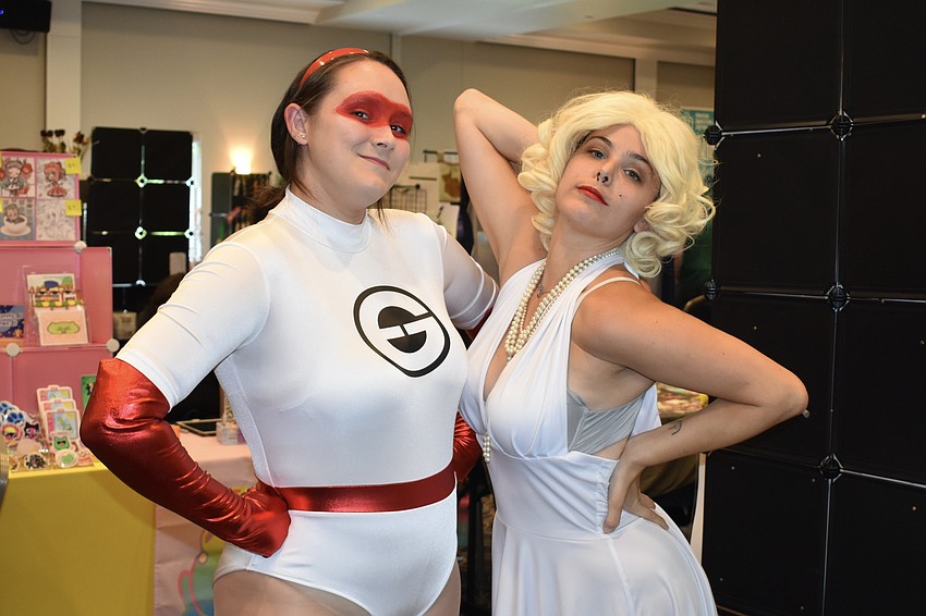 Liz Hall, dressed as Elastigirl from The Incredibles, and Victoria Padilla, dressed as Marilyn Monroe