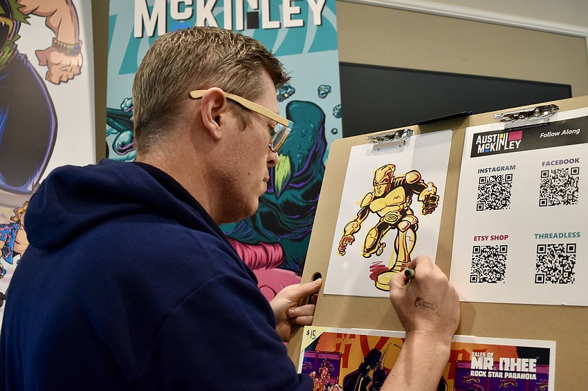 Sarasota comic book artist Austin McKinley draws Bionic Sarge, the reborn version of Sarge, a character he created for his comic book series Riot Force.