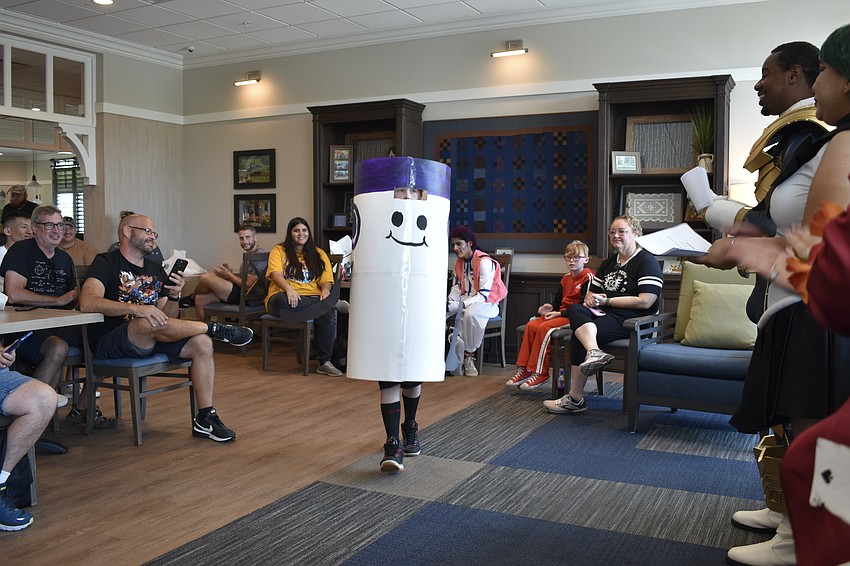 Eli Jacobs, 10, takes the stage in the costume contest, dressed as Purple Marker from his favorite game, Find the Markers, in a self-made costume.