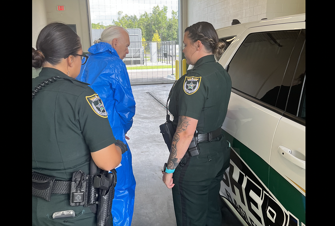 FCSO deputies place Charles Kidd Jr., center, under arrest. Photo courtesy of the FCSO