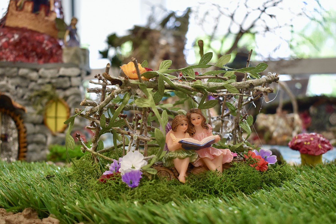 The Fairy Village, like the group's other work, is created from a wide variety of repurposed materials.