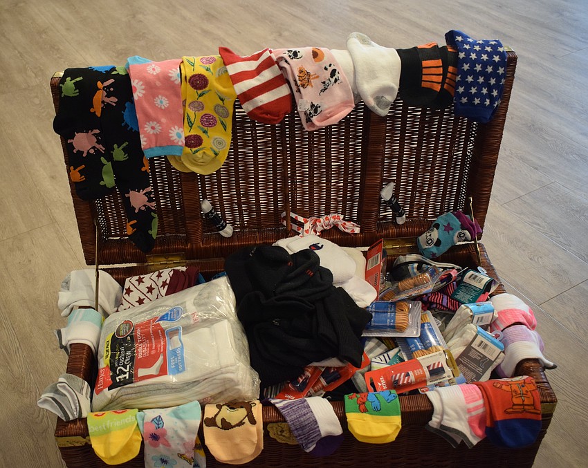 In the month of August, Longboat Island Chapel collect children's socks and shoelaces for Stillpoint Mission.