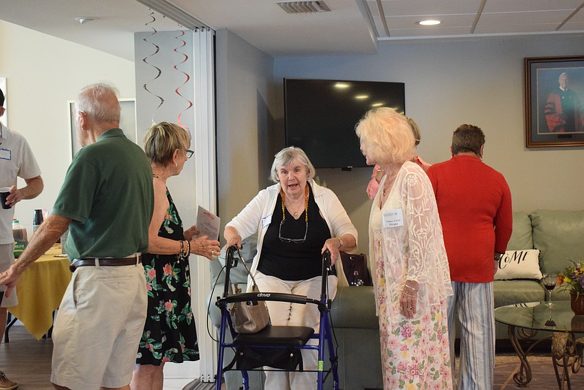 Longboat Island Chapel hosted their monthly charity happy hour collecting children's socks and shoelaces on Aug. 15.