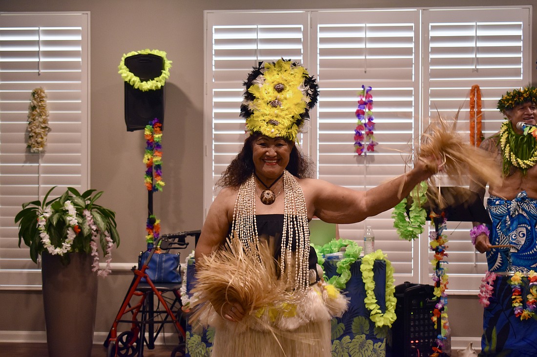 Maya Taeoalii dances for the audience, but she arrived before the performance at Grand Living at Lakewood Ranch to teach the ladies how to hula dance.