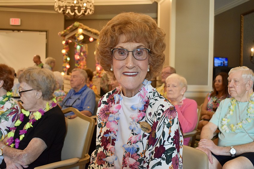Dorothy Hare attends a luau by the Royale Polynesian Revue at Grand Living at Lakewood Ranch.