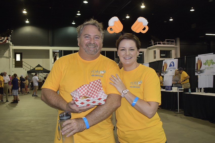 Bob Stone, vice president of the Rotary Club, and Jill Gass