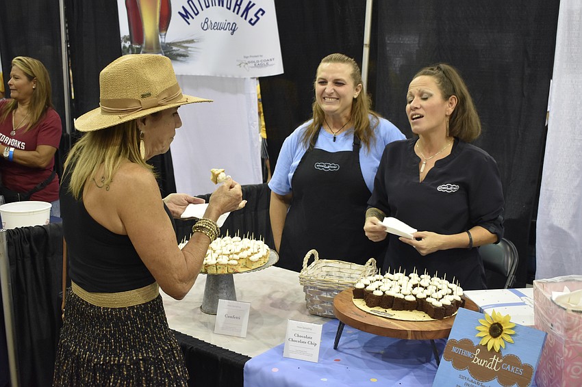 Shirley Aschenbrenner enjoys a cake sample set out by Amy Skinner and Michelle Potts of Nothing Bundt Cakes.