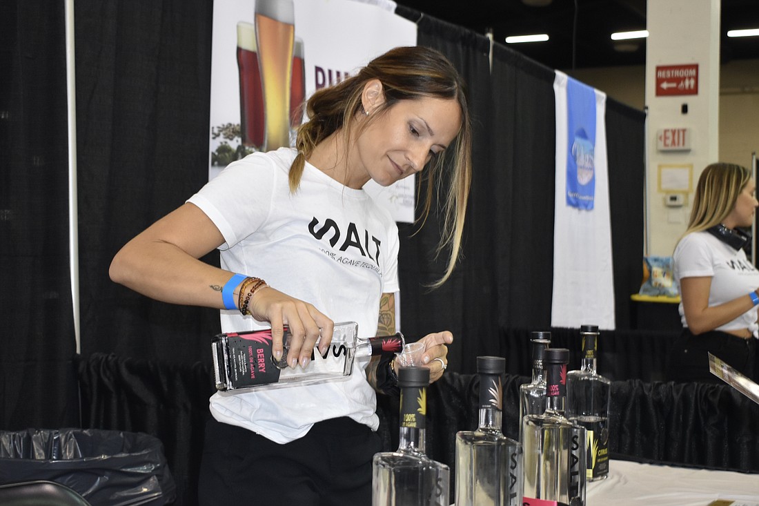 Julie Martin pours SALT Tequila.